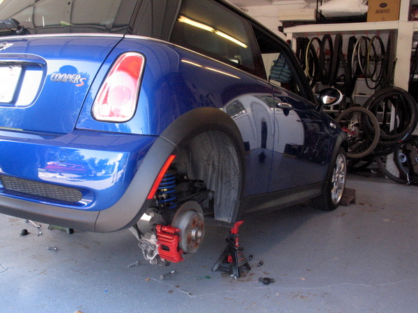  out of the suspension without removing the shocks and brakes Mini 